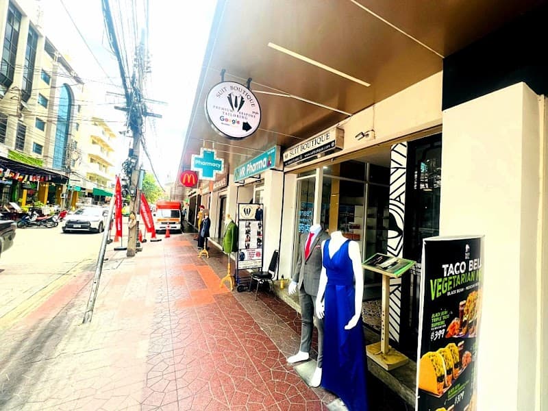 Suit Boutique Bespoke Tailor .