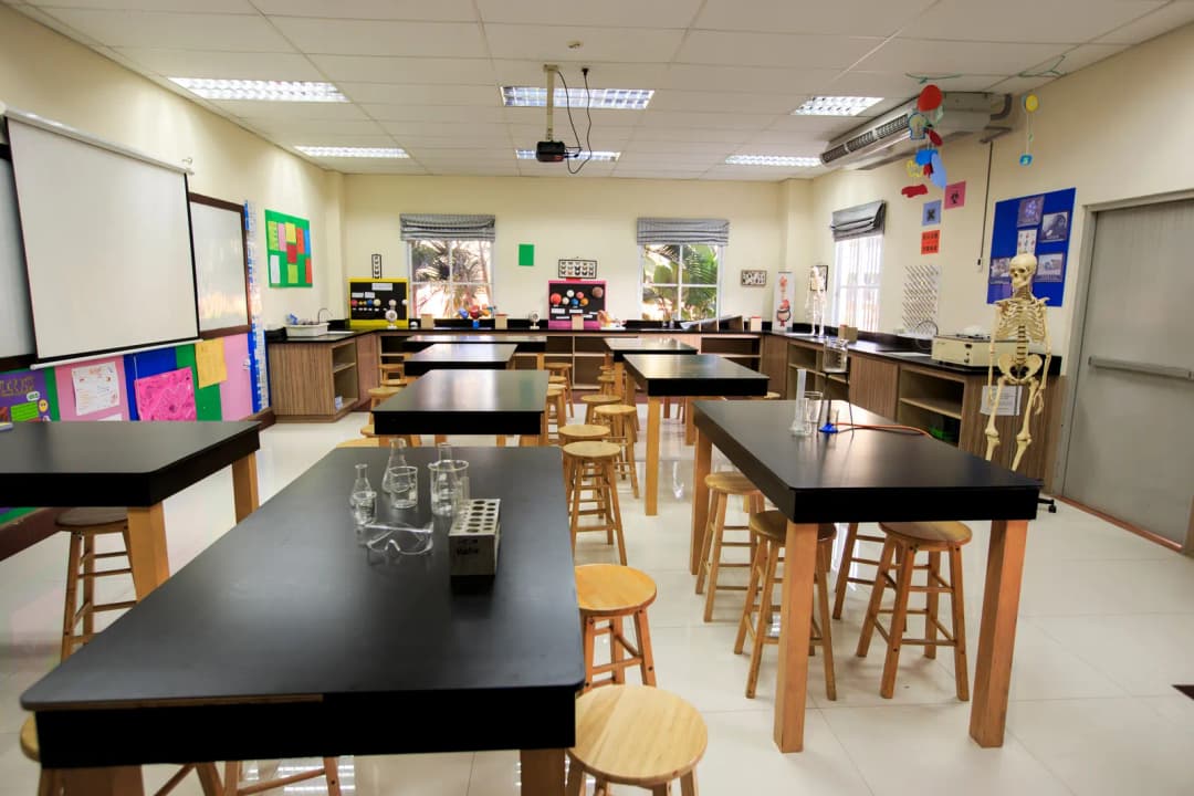 Science laboratory with lab benches, stools and glassware in an international school in Bangkok